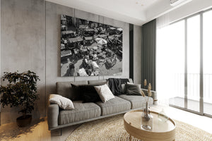 black and white photo of crowded marketplace in India