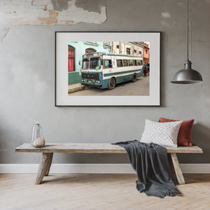 Cuba street scene with old bus and pastel buildings