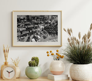 overhead view of crowded market street India black and white