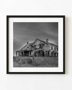 Black and white abandoned farmhouse in rural Indiana