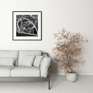 Classic steering wheel with Cadillac emblem in black and white