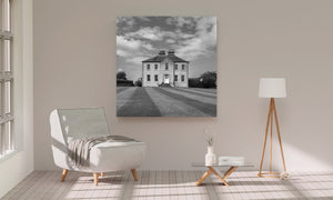 Historic rural home with sash windows and multiple chimneys