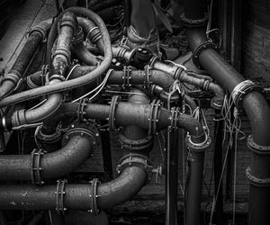 Mechanical pipework artwork in monochrome