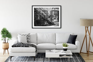 Close-up of iron steps with urban graffiti backdrop in Oslo