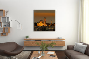 Twilight view of Istanbul mosque with surrounding urban buildings