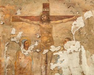 Jesus on a cross in an aged Italian wall fresco
