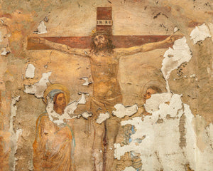 Ancient religious wall painting showing a crucifixion scene