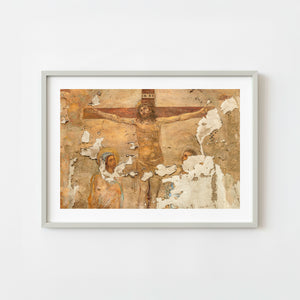 Weathered Italian crucifixion fresco with peeling plaster