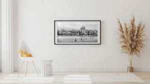 Historic dome of Tempio Votivo with shoreline buildings
