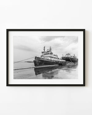 James A. Hannah tugboat moored at a rainy Hamilton dock