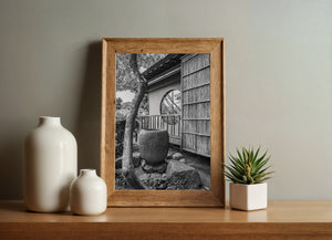 Traditional wooden building and stone elements in Japanese garden