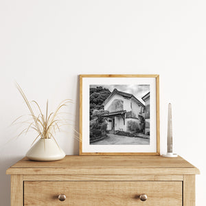 Classic Japanese storage building with tiled roof black and white