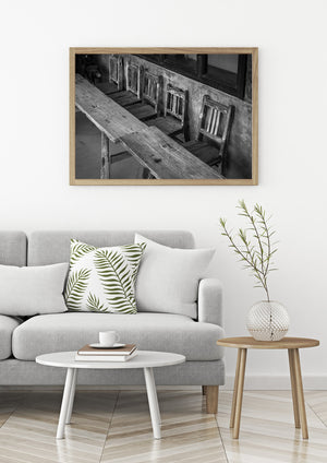 Minimalist black and white still life photography of wooden furniture