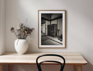 Traditional household objects beside antique chest in Japanese historic room