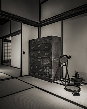Historic Japanese samurai residence interior with wooden chest and tatami floor