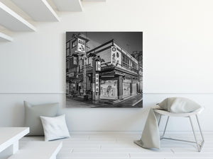 Quiet Tokyo side street with traditional architecture in monochrome