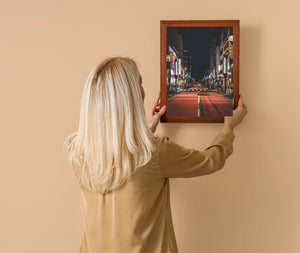 Symmetrical Tokyo road with street lights and crosswalk at night