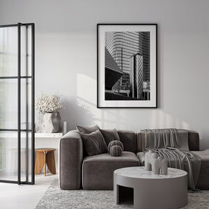 Monochrome cityscape showing geometric glass and steel structures