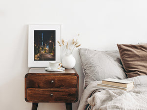 quiet Tokyo neighborhood street leading toward Skytree at night