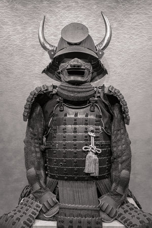 Monochrome still life of horned samurai helmet and face mask