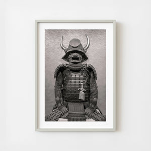 Horned samurai helmet and armor in monochrome portrait