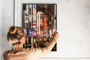 Japanese city alley glowing with restaurant signs and warm lighting