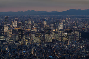 Downtown Tokyo buildings illuminated after sunset