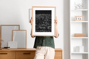 High angle black and white photograph of Tokyo urban skyline and waterways