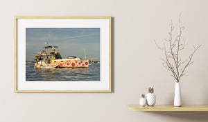 Warm light on a weathered houseboat anchored in Key West