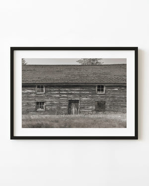 Weathered wooden storage building in Killarney Ontario in black and white