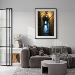 Historic Dublin prison passage leading toward an arched window