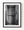 Locked cell door at Kilmainham Gaol in black and white