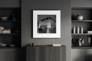 Black and white photograph of Prague palace architecture after dark