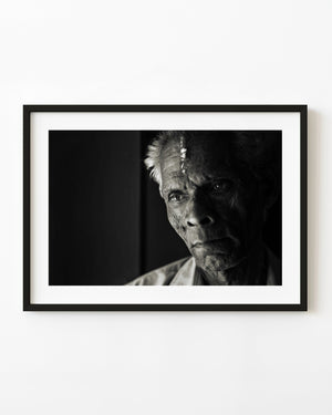 Toned monochrome portrait of an elderly man in Kochi India
