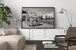 Geometric glass panels contrast with Brooklyn Bridge and the city skyline.