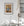 Vertical colour study of overlapping signatures and worn paint at La Bodeguita.