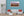 Pink and lavender sky above Lake Powell’s winding water and sandstone mesas.