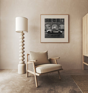 Monochrome photograph of London supercar and fashion shop