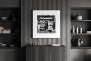 Black and white photo of classic newsstand