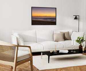 Australian coastal photograph of Long Reef Beach under a warm dawn horizon