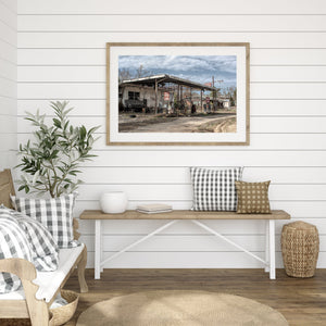 Weathered self serve sign at old gas station