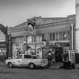 Abandoned service station exterior in Lowell Arizona black and white photography