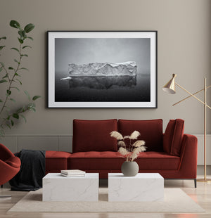 Antarctic Iceberg Amid Snowstorm Serenity