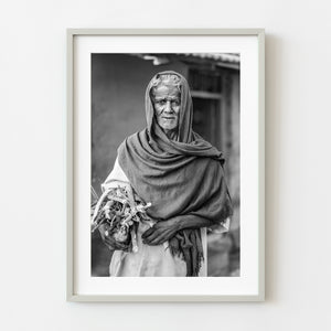 Elderly man carrying sticks Dheboor India