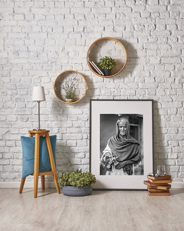 Man holding sticks black and white print