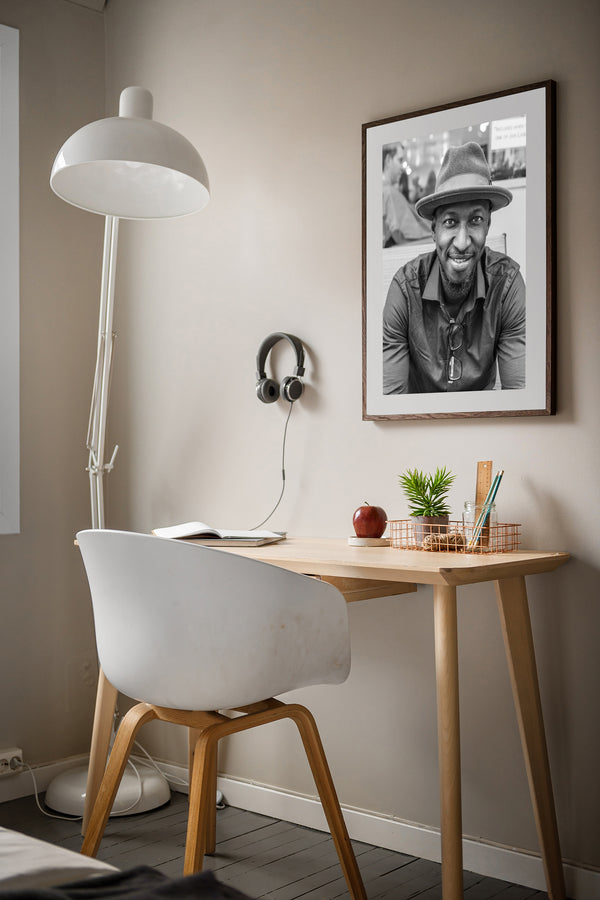 Man with beard and fedora by barber shop wall art