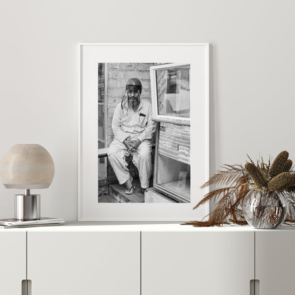 Man sitting in Mysore black and white print