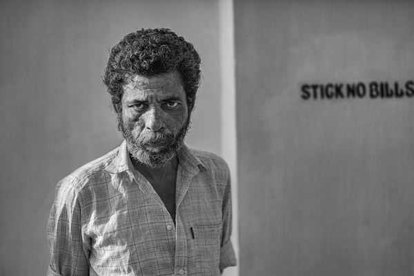 Intense black and white portrait of man in India