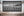 Panoramic black and white photograph of Manhattan from Brooklyn Bridge Park