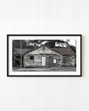 Abandoned southern building with peeling wood siding